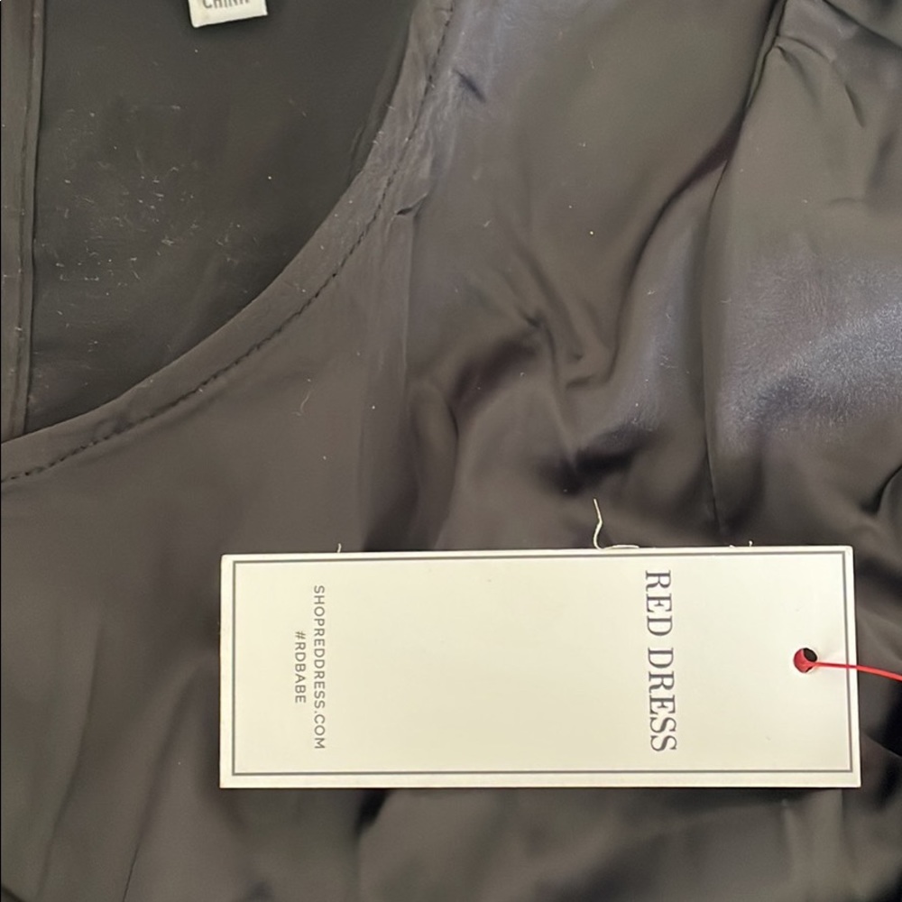 bought jumpsuit from red dress but it didn’t fit me.It’s brand new,never worn.